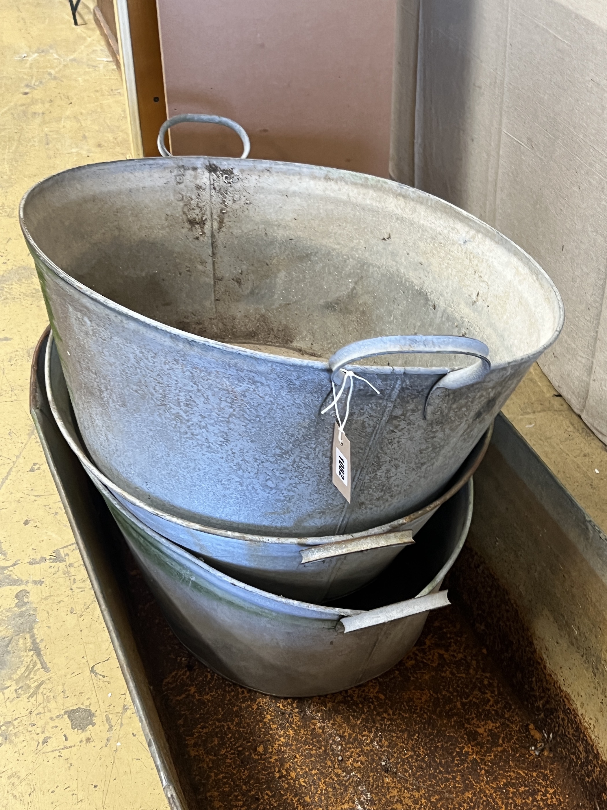 Four vintage galvanised containers, largest width 120cm, height 28cm